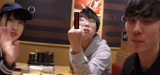 One finger salute Diner gives the finger in TkyoSam's sushi conveyor video